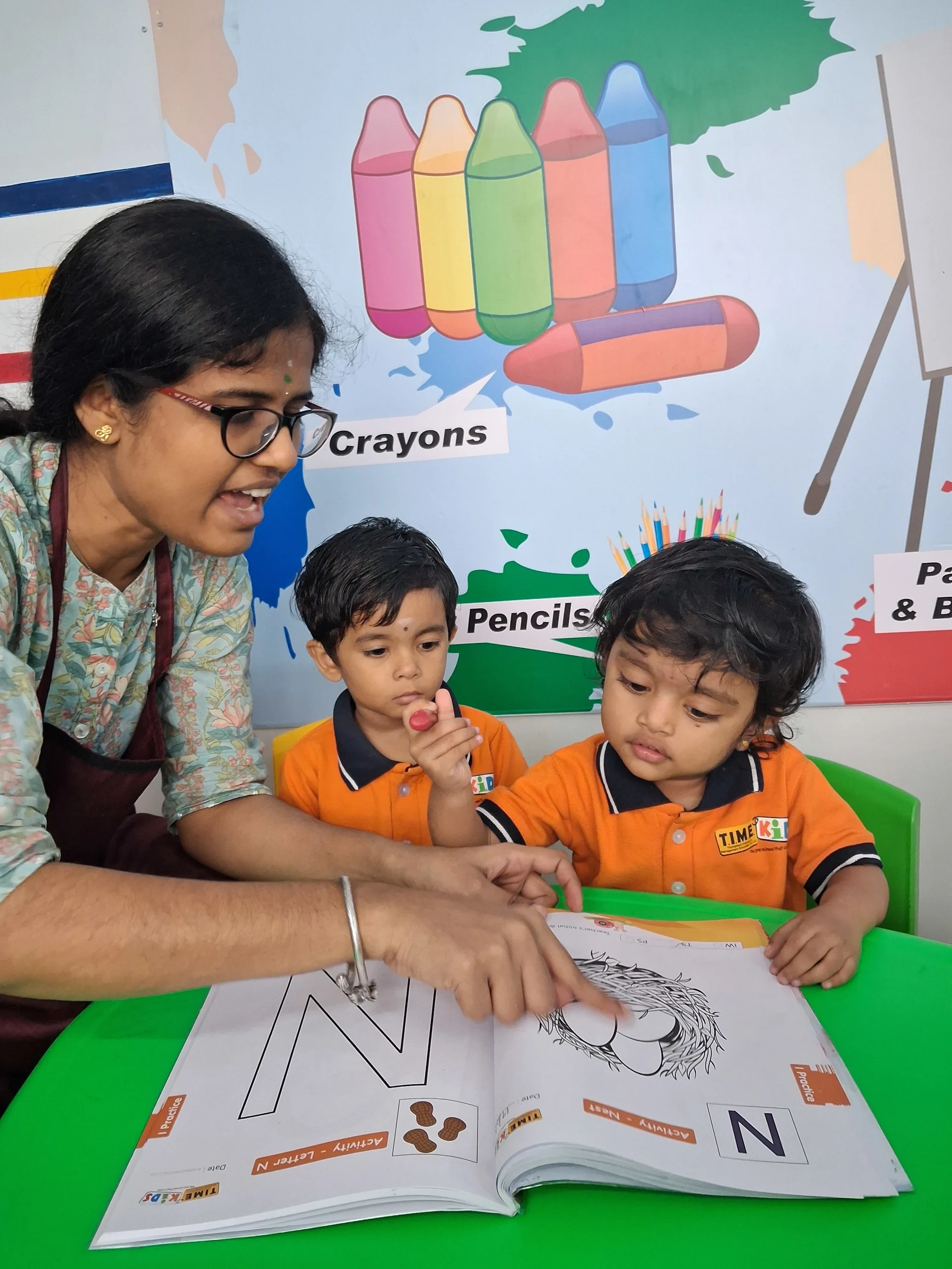 Time Kids Anna Nagar teachers interacting with children during open house