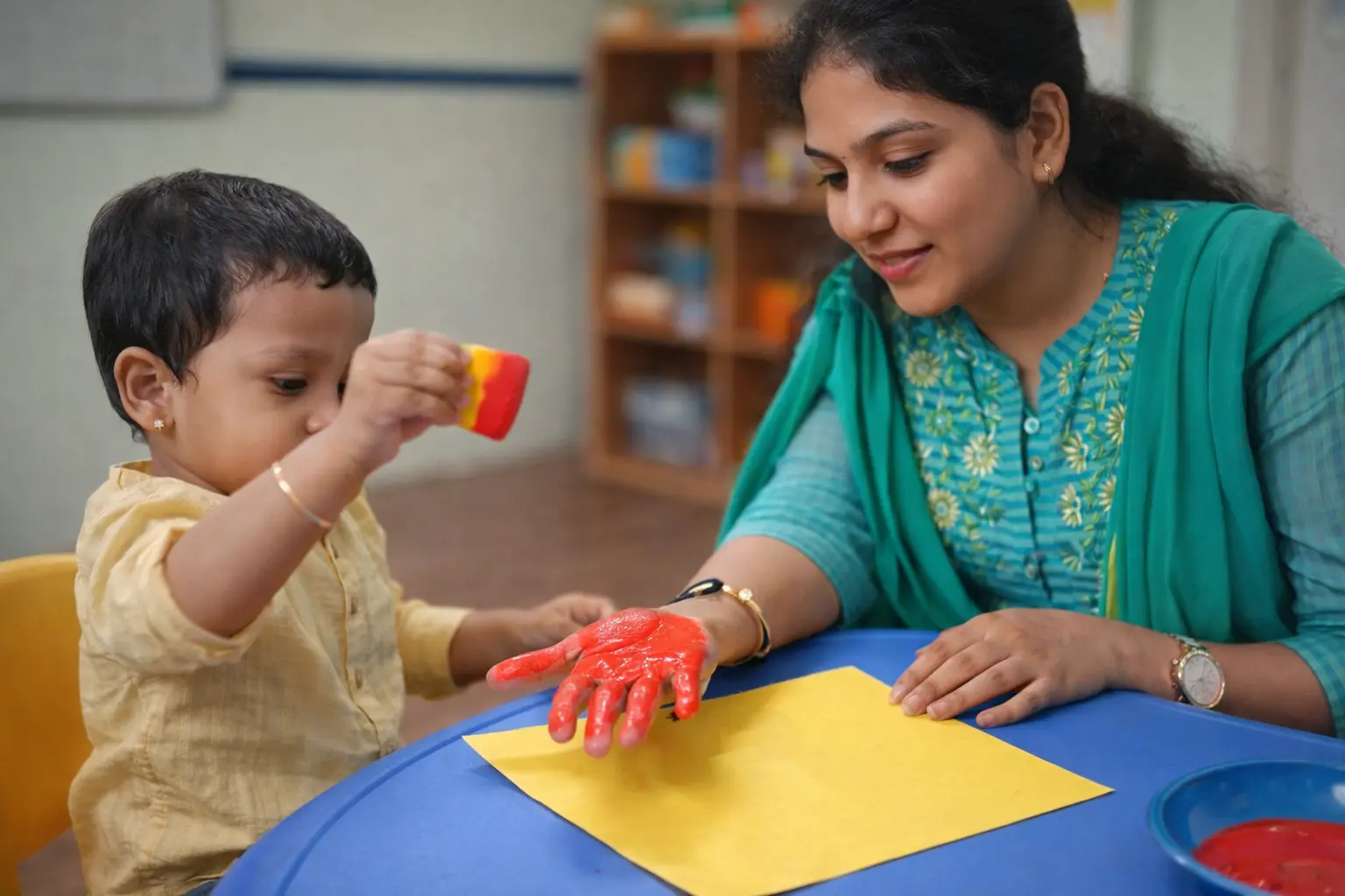 Parent and toddler calm settling-in activity at early toddler program in Anna Nagar
